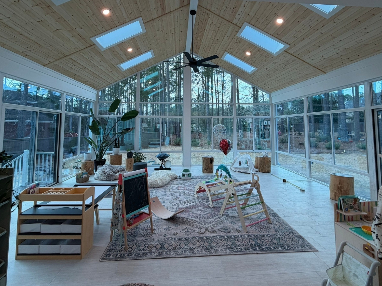 Inside Gabled All Glass Sunroom with skylights & wood ceiling in Auburn AL